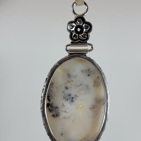 Handmade Silver Pendant With White Dendritic Opal & Floral Bail Detailing - Picture 7 of 10